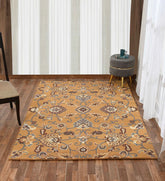 Traditional wool rug with floral and vine motifs in gold and brown
